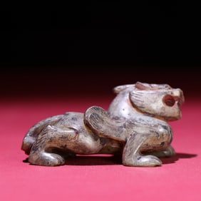 An Exquisite White Jade Auspicious Beast Ornament