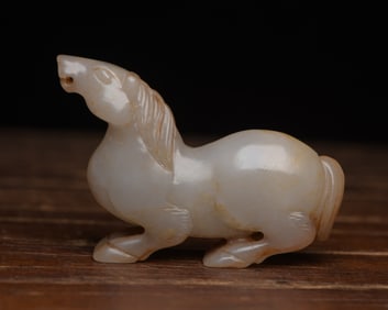 An Exquisite White Jade Horse Pendant