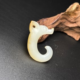 An Exquisite White Jade Pig Pattern Pendant