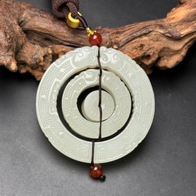 An Exquisite White Jade Dragon and Phoenix Pattern Pendant