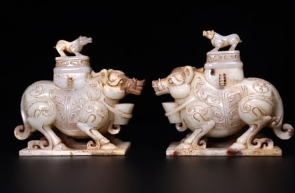 A Pair of Exquisite White Jade Pig-Shaped Vases
