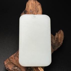 An Exquisite White Jade Pendant
