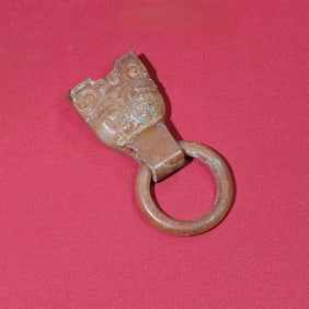 An Exquisite White Jade Beast-Face Pattern Pendant