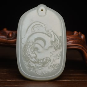 An Exquisite White Jade Dragon Pattern Pendant