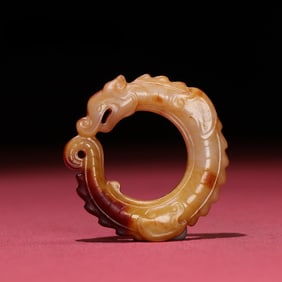 An Exquisite White Jade Dragon Pendant