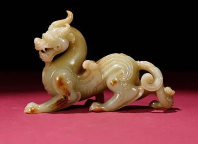 An Exquisite White Jade Auspicious Beast Ornament