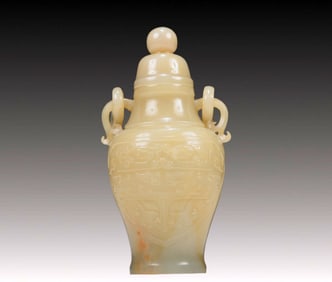 An Exquisite Yellow Jade 'Animal Mask' Vase And Cover
