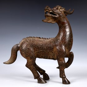 A Rare Bronze Kylin Ornament