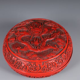 An Exquisite Carved Red Lacquer Auspicious Cloud and Dragon Pattern Box with Cover