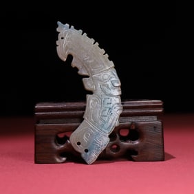 An Exquisite White Jade Human-Face Pattern Pendant