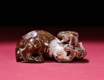 An Exquisite Gaogu Jade Auspicious Beast Ornament