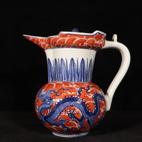 An Exquisite Iron-Red Glazed Blue and White Seawater and Dragon Pattern Pot