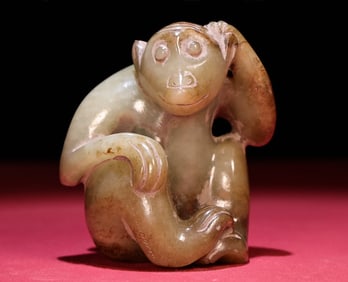 An Exquisite White Jade Monkey Hand Piece