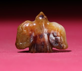 An Exquisite White Jade Bird Pendant