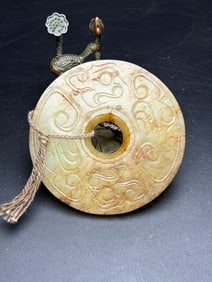 An Exquisite White Jade Pendant