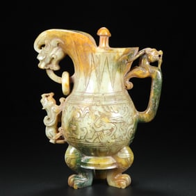 A Rare White Jade Auspicious Beast Pattern Dragon-Handle Tripod Goblet