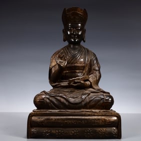 A Solemn Gilt Bronze Statue of Guru