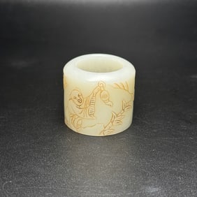 An Exquisite White Jade Figure Pattern Fingerstall