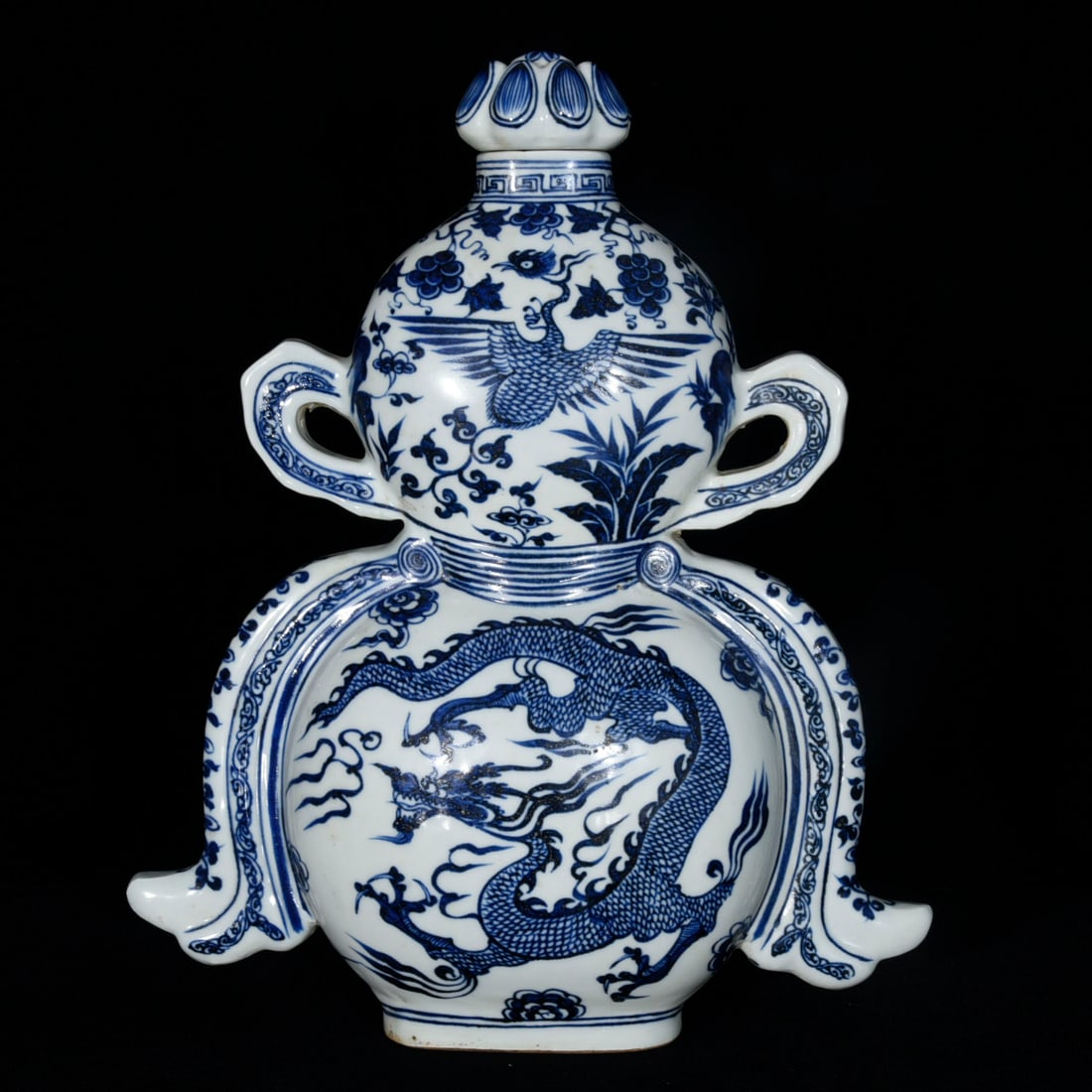 A Rare Blue and White Dragon and Phoenix Pattern Gourd-Shaped Bottle: A Rare Blue and White Dragon and Phoenix Pattern Gourd-Shaped Bottle,Yuan Dynasty, China,Size:36cmx30cmx10cm 青花龙凤纹葫芦盖瓶,中国&#