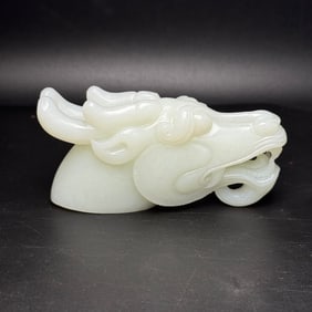 An Exquisite White Jade Dragon-head Hand Piece