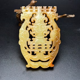 An Exquisite Yellow Jade Beast-Face and Phoenix Pattern Pendant