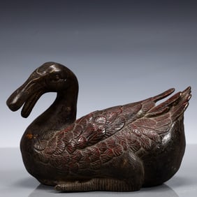 A Solemn Gilt Bronze Duck Ornament