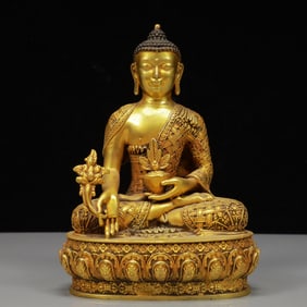 A Solemn Gilt Bronze Statue of Sakyamuni