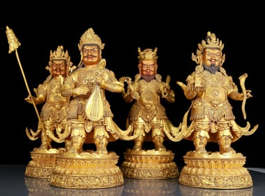 A set of huge gilt bronze statues of the Four Heavenly Kings