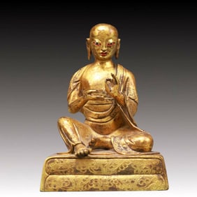 A Solemn Gilt Bronze Statue of Guru