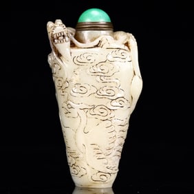 An Exquisite White Jade Dragon and Phoenix Pattern Snuff Bottle