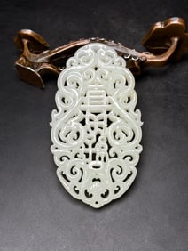 An Exquisite White Jade Dragon Pattern Pendant
