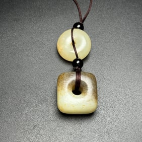 An Exquisite White Jade Pendant