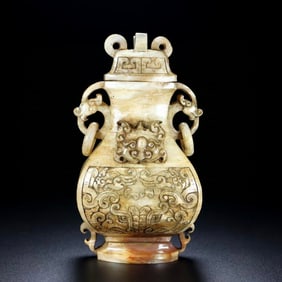 A Rare White Jade Beast-Face Pattern Double-Ears Bottle
