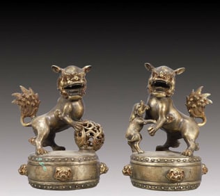 A Pair of Rare Gilt Silver Lion Ornaments