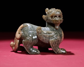 An Exquisite Gaogu Jade Auspicious Beast Ornament