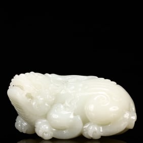 An Exquisite White Jade Auspicious Beast Ornament
