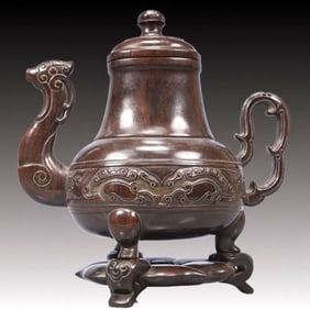 An Exquisite Zitanwood Auspicious Cloud Pattern Tripod Ewer, With Base