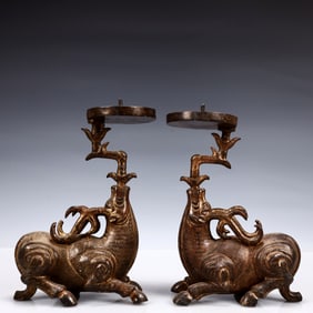 A pair of Solemn Gilt Bronze Deer-Shaped Candlestick