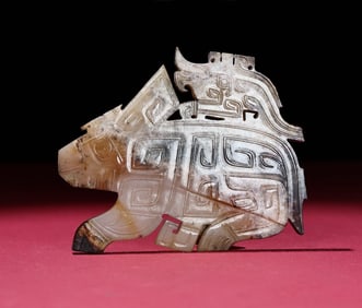 An Exquisite White Jade Auspicious Beast Pendant