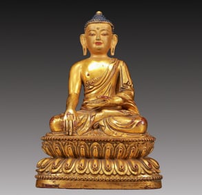 A Solemn Gilt Bronze Statue of Sakyamuni