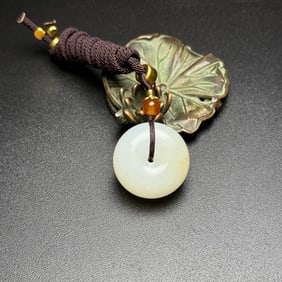 An Exquisite White Jade Pendant