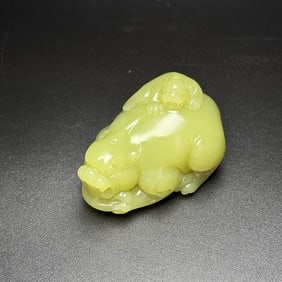 An Exquisite Hotan Jade Auspicious Beast Hand Piece