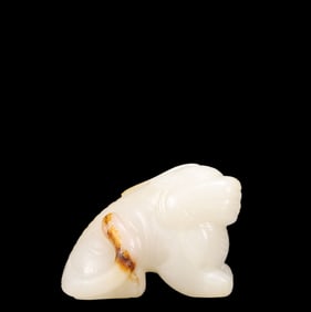 An Exquisite White Jade Auspicious Beast Ornament