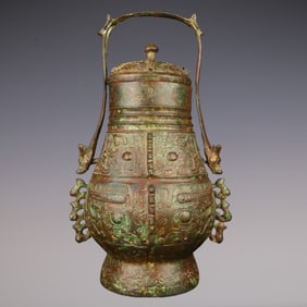 An Exquisite Bronze Beast-Face Pattern With Inscription Ewer