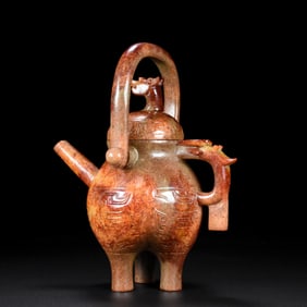 An Exquisite White Jade Beast-Face Pattern Ewer