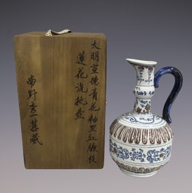 An Exquisite Blue and White Underglaze-Red Lotus Pattern Ewer