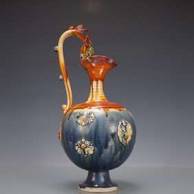 A Exquisite Trio-colored glazed pottery of the Tang Dynasty Dragon Pattern Ewer