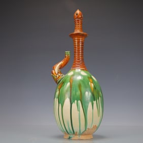 A Exquisite Trio-colored glazed pottery of the Tang Dynasty Ewer