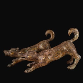 A pair of Rare Bronze Gold-Inlaid Wolf-dog Ornaments