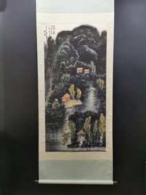 A vertical scroll of Chinese ink landscape painting on paper